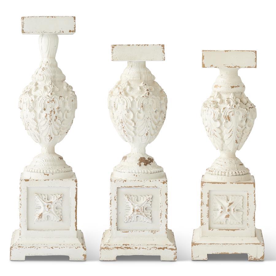 Set of three whitewashed wooden candle holders